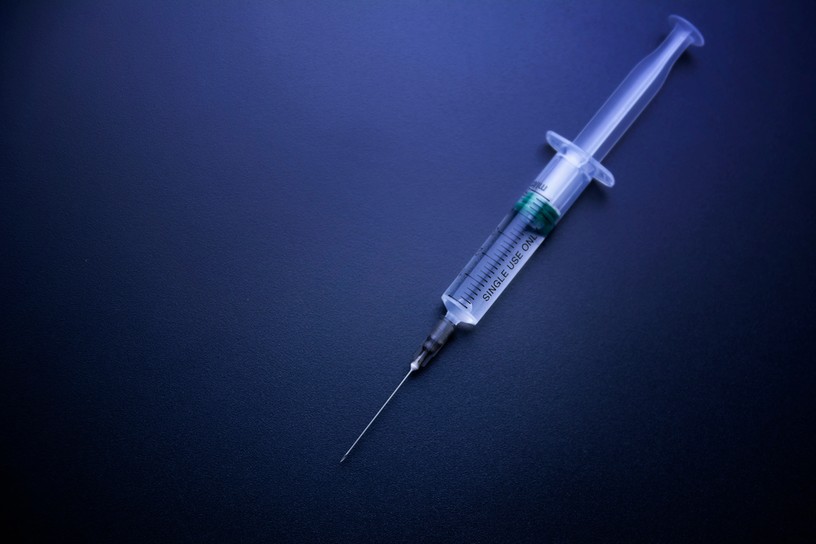 Syringe on Dark Counter