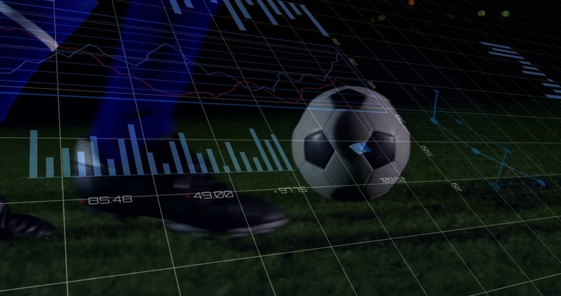 Footballer Kicking Ball Against Data Charts