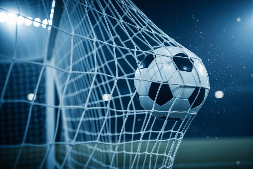 Football Hitting Net in Dark Stadium