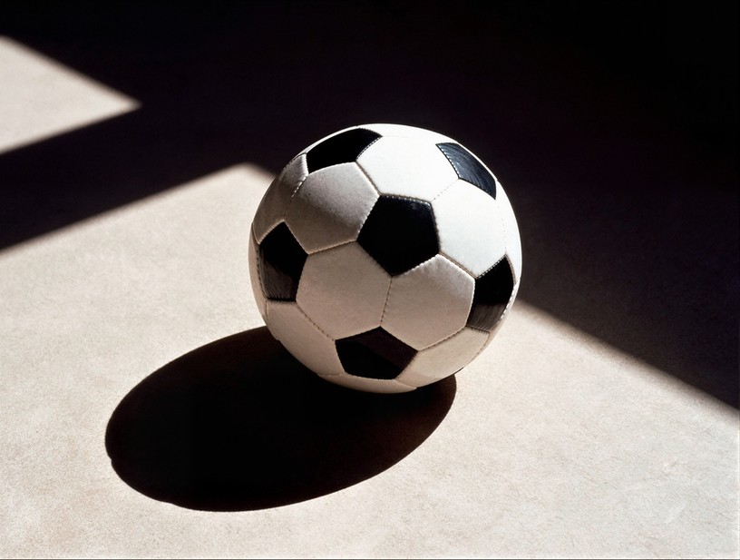 Traditional Football Casting Shadow