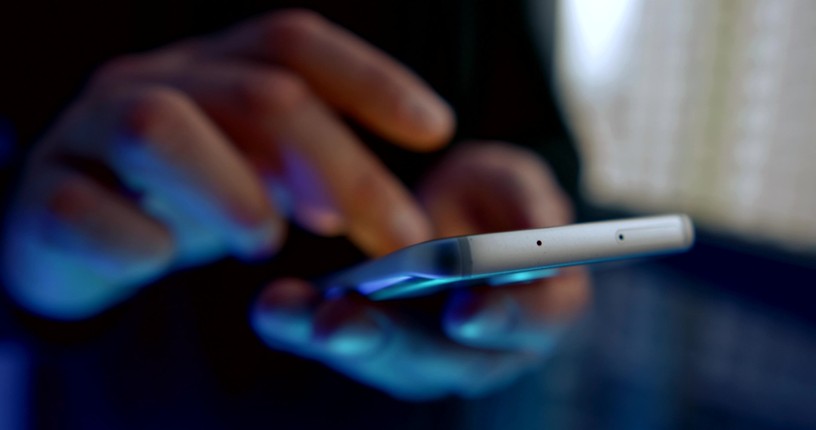 Blurred Hand Typing on Phone