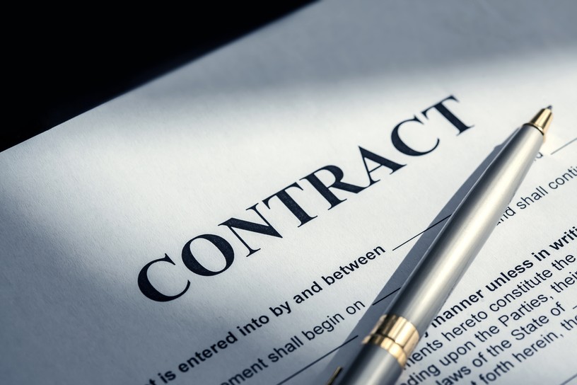 Contract with Silver and Gold Pen