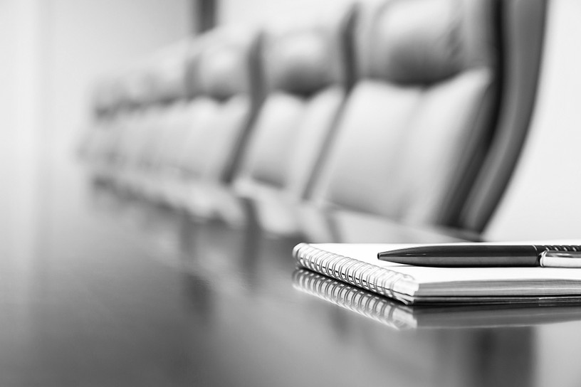 Empty Row of Boardroom Chairs