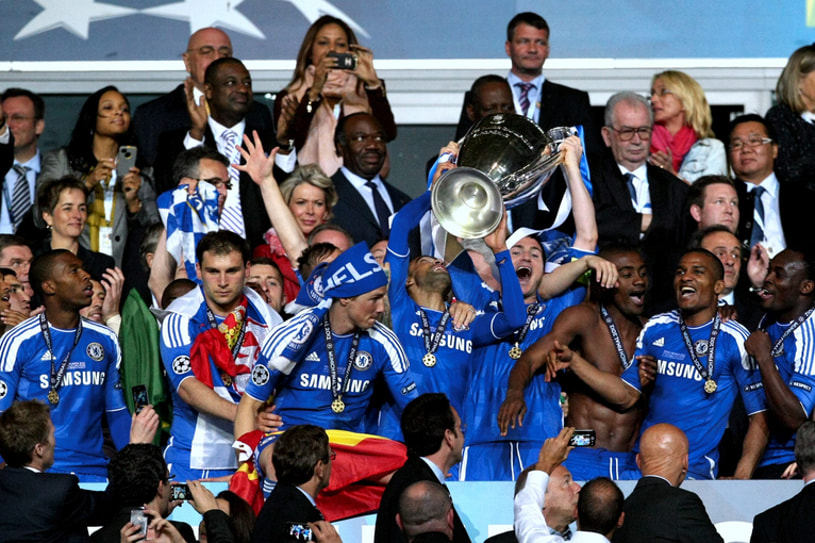 Frank Lampard celebrates winning the Champions League