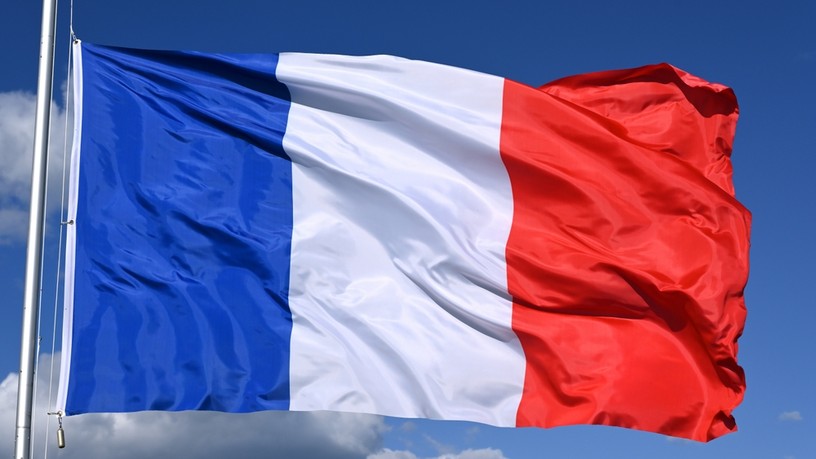 French Flag Close Up Against Blue Sky