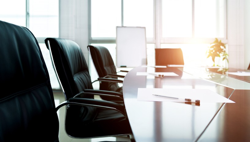 Empty Boardroom with Black Chairs