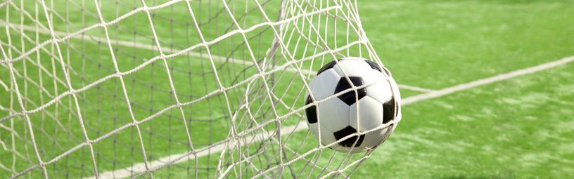Traditional Football Against Goal Net