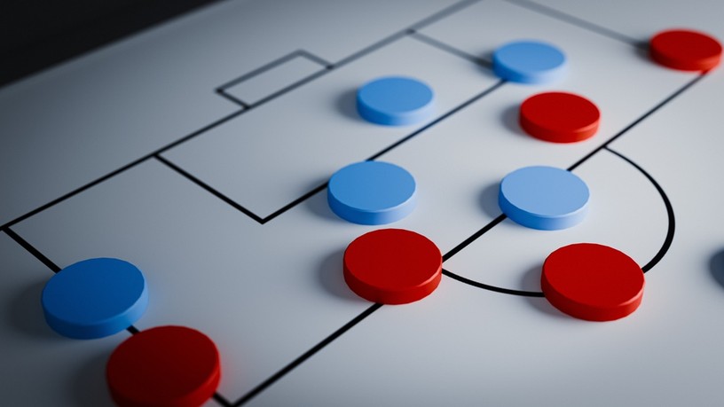 Blue and Red Counters on Football Tactics Board