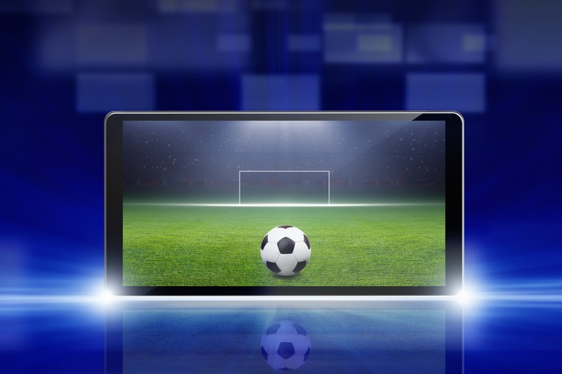 Football Pitch on Phone Against Blue Background
